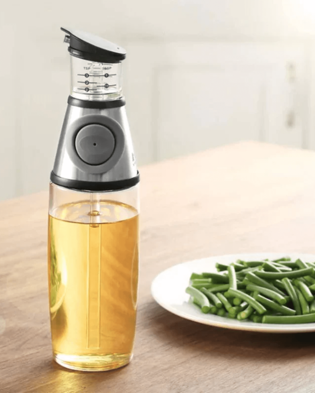 Press and Measure Glass Oil Dispenser