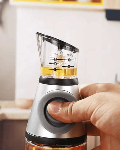 Press and Measure Glass Oil Dispenser